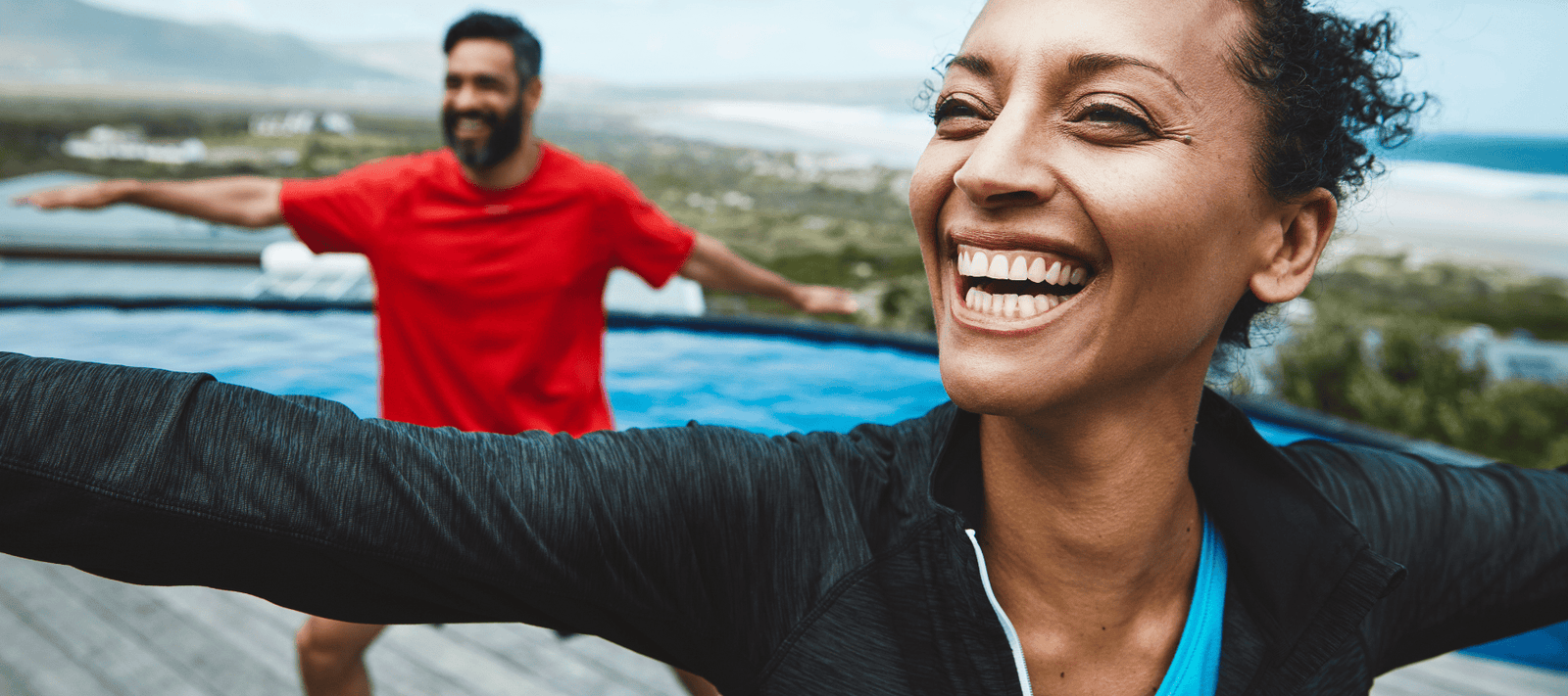 woman smiling and breathing better while exercising