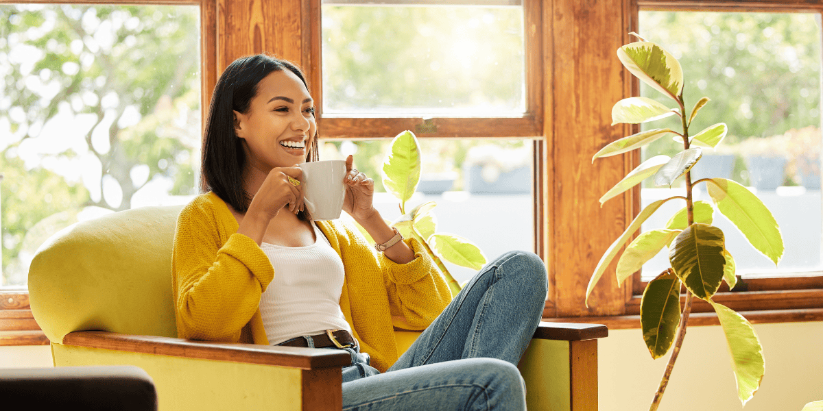 woman smiling while drinking with mouth taping before and after context