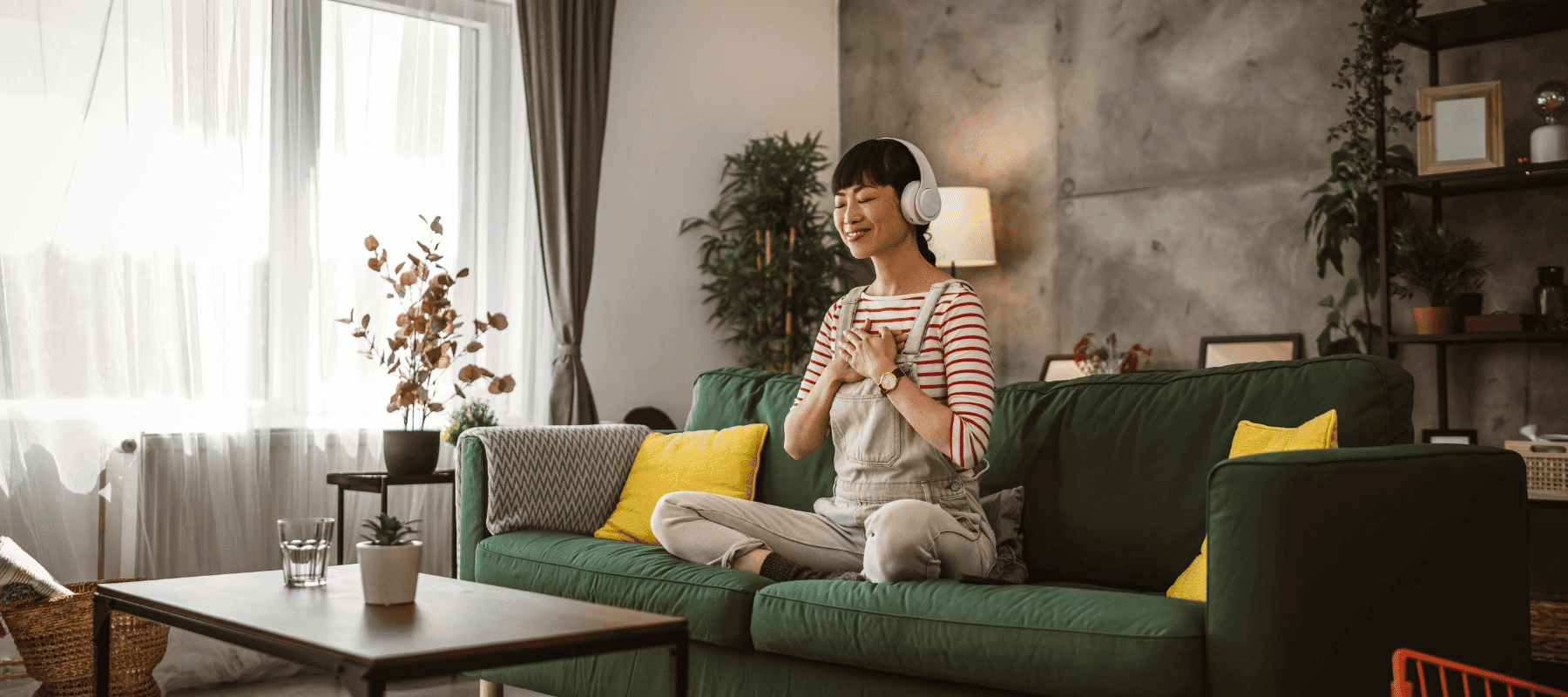 woman on couch meditating how to boost brain function
