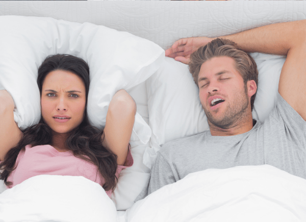 woman can't sleep because husband is snoring and how is breathing through your mouth bad