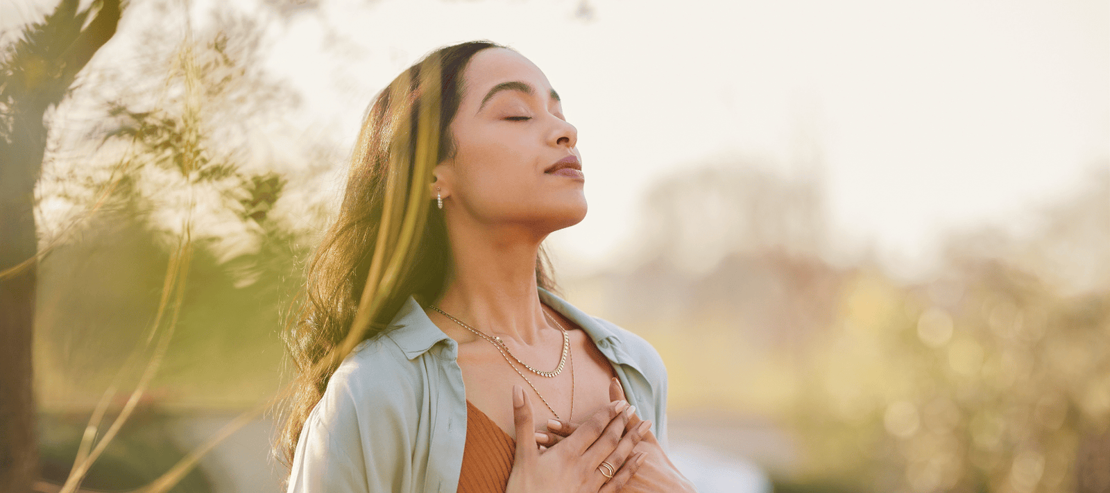 woman taking a big breath showing mouth breathing vs nose breathing