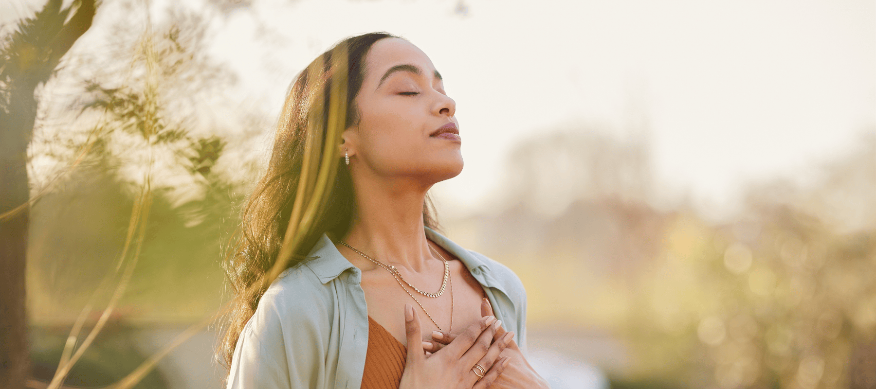 woman taking a big breathe