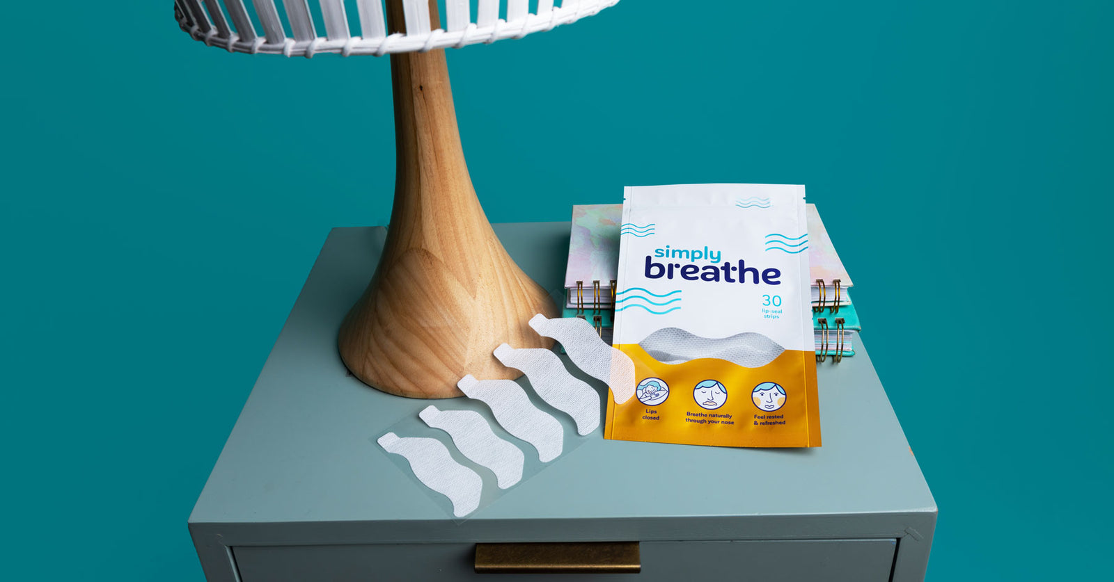 Simply breathe, the best mouth tape for sleeping, on a nightstand